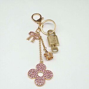 Authentic Louis Vuitton Gold Lock 🔒 Unbranded Flower Keychain Bag Charm LV